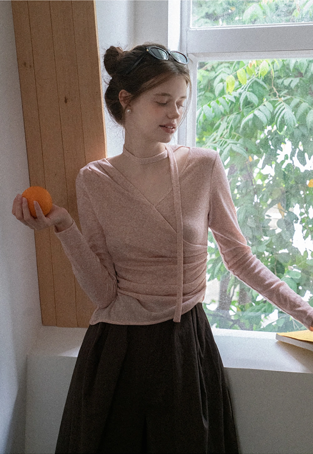 Asymmetrical rap-front draped knit top