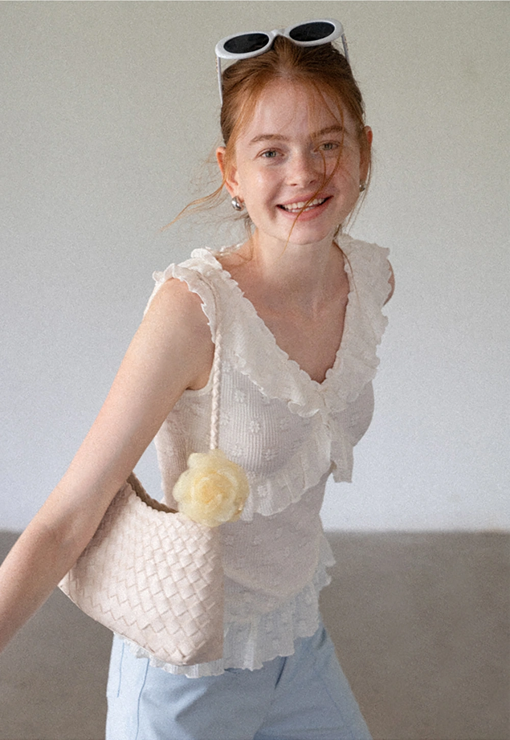 Women’s Sleeveless Ruffle Knit Top