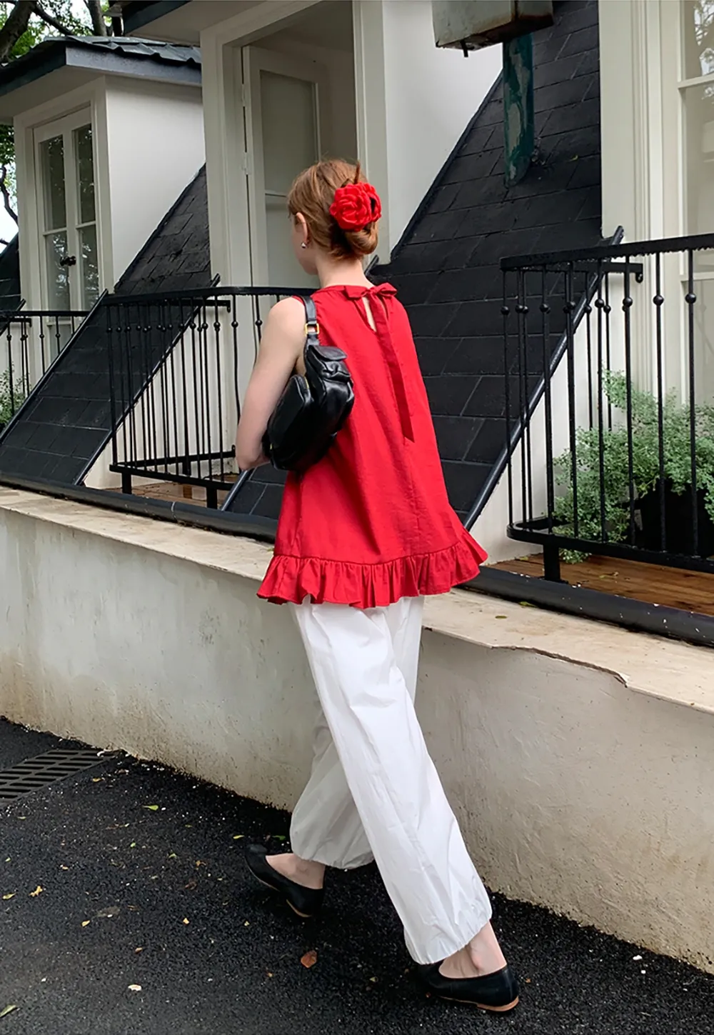 Women’s Sleeveless Ruffle Hem Top with Back Bow Tie