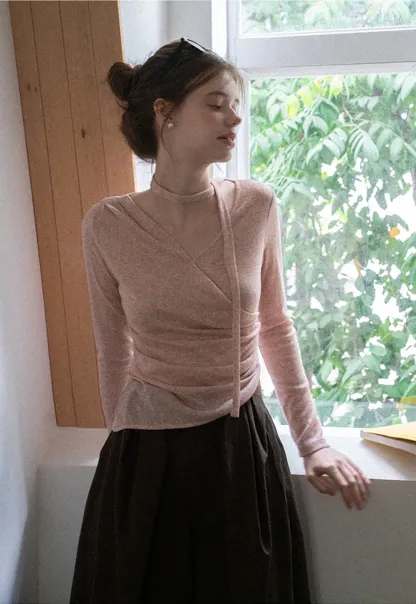 Asymmetrical rap-front draped knit top