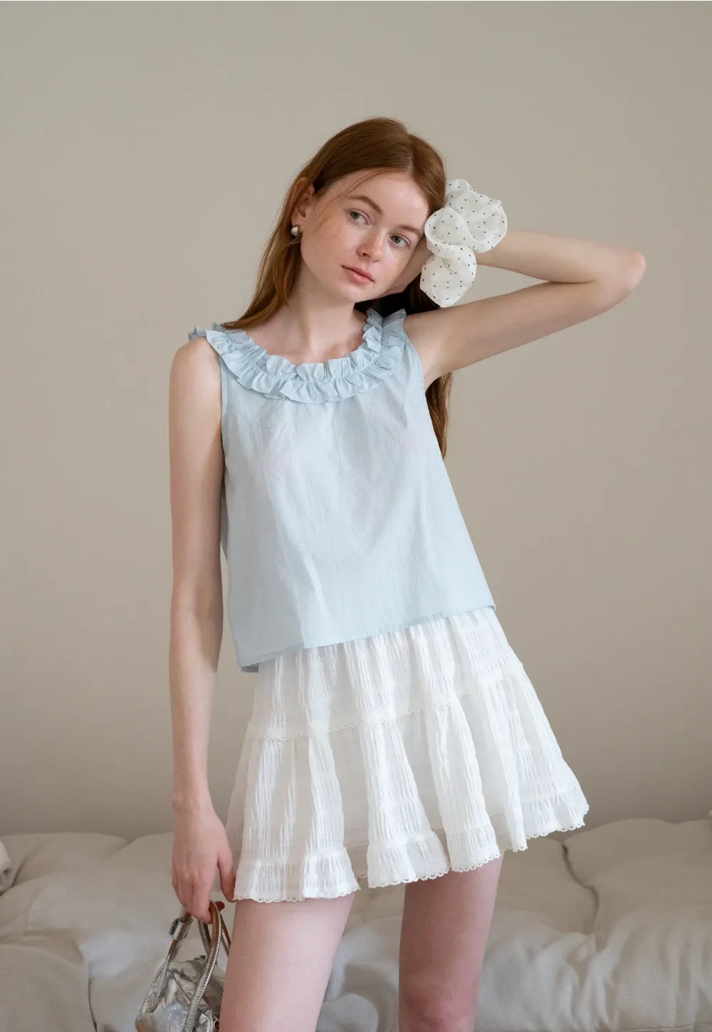 Women’s Sleeveless Top with Ruffle Neckline