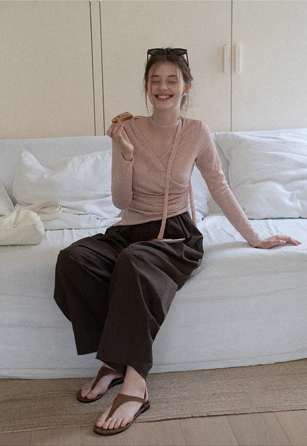 Asymmetrical rap-front draped knit top