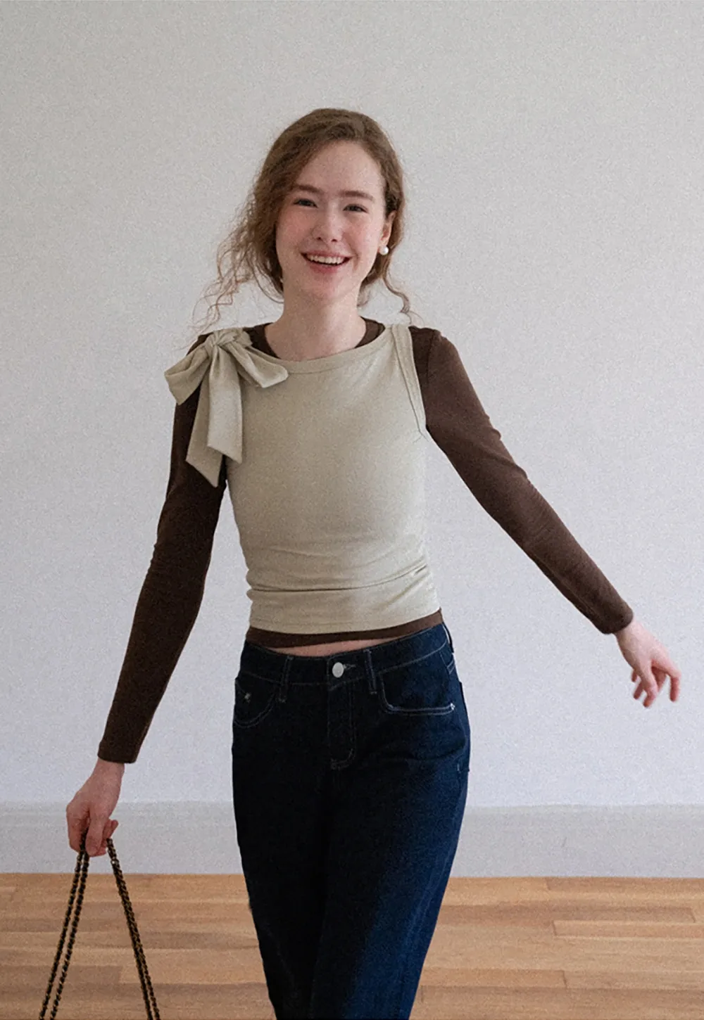 Womens Sleeveless Top with Bow Detail