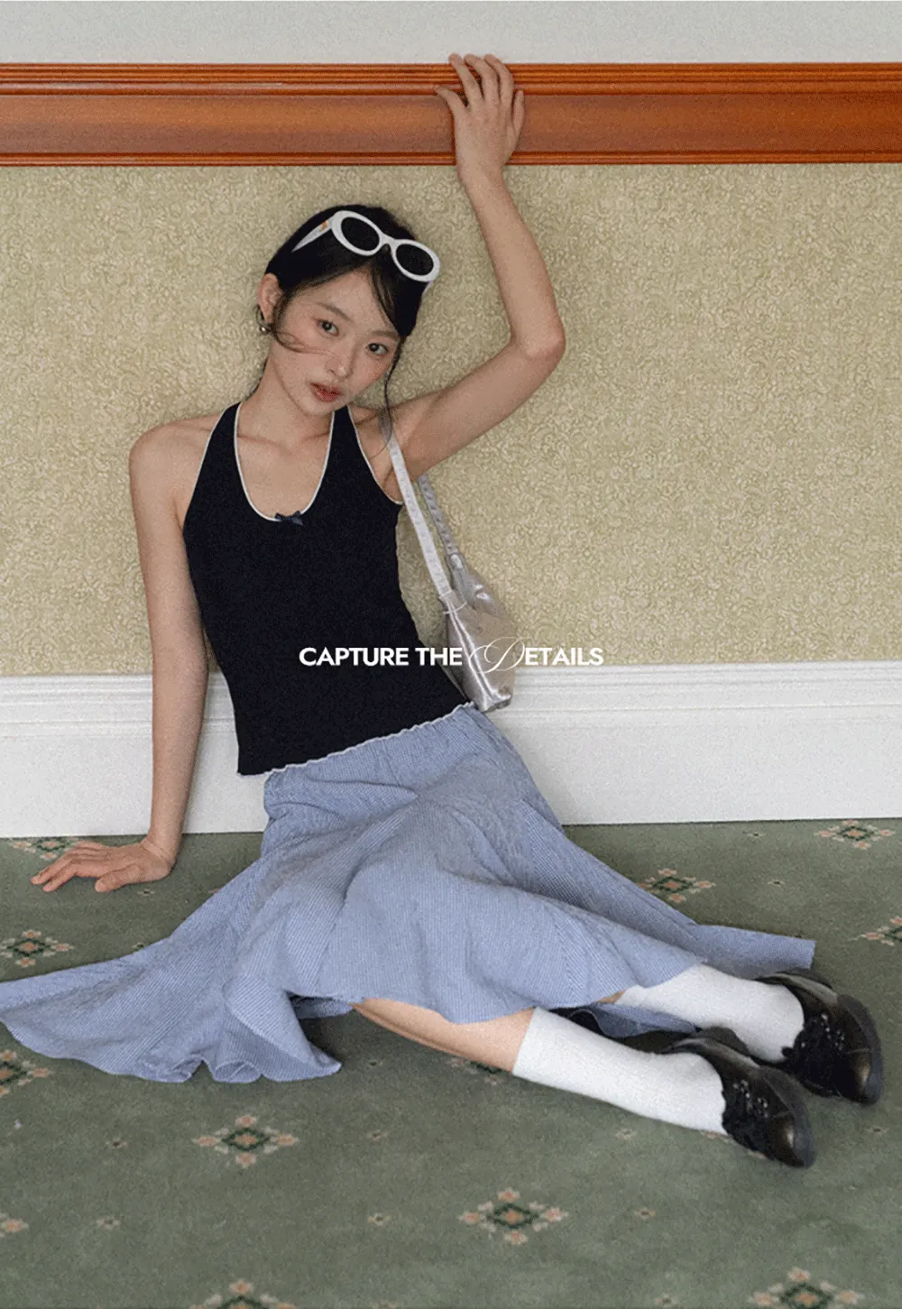 Halter neck tank top with thin straps and bow detail