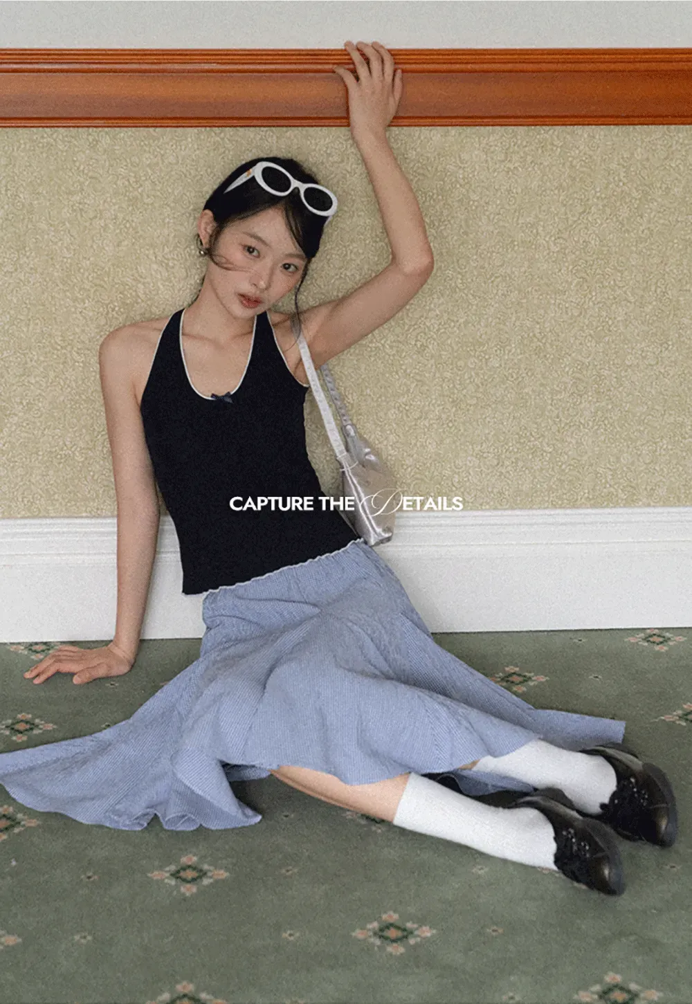 Halter neck tank top with thin straps and bow detail