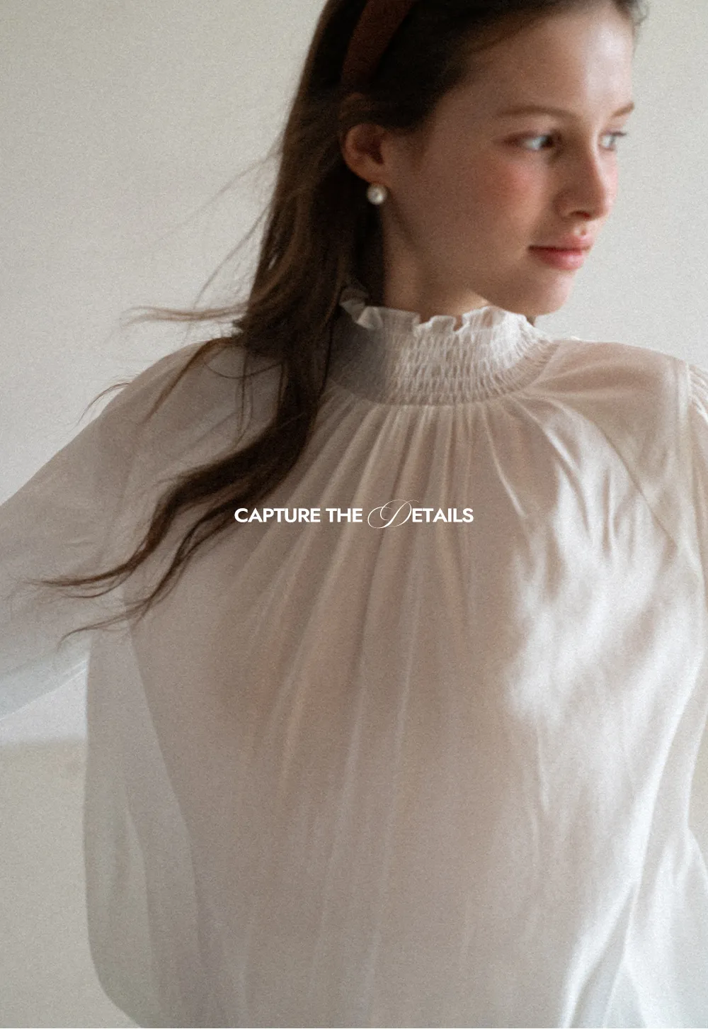 Elegant High Neck Blouse with Ruffled Cuffs and Hem