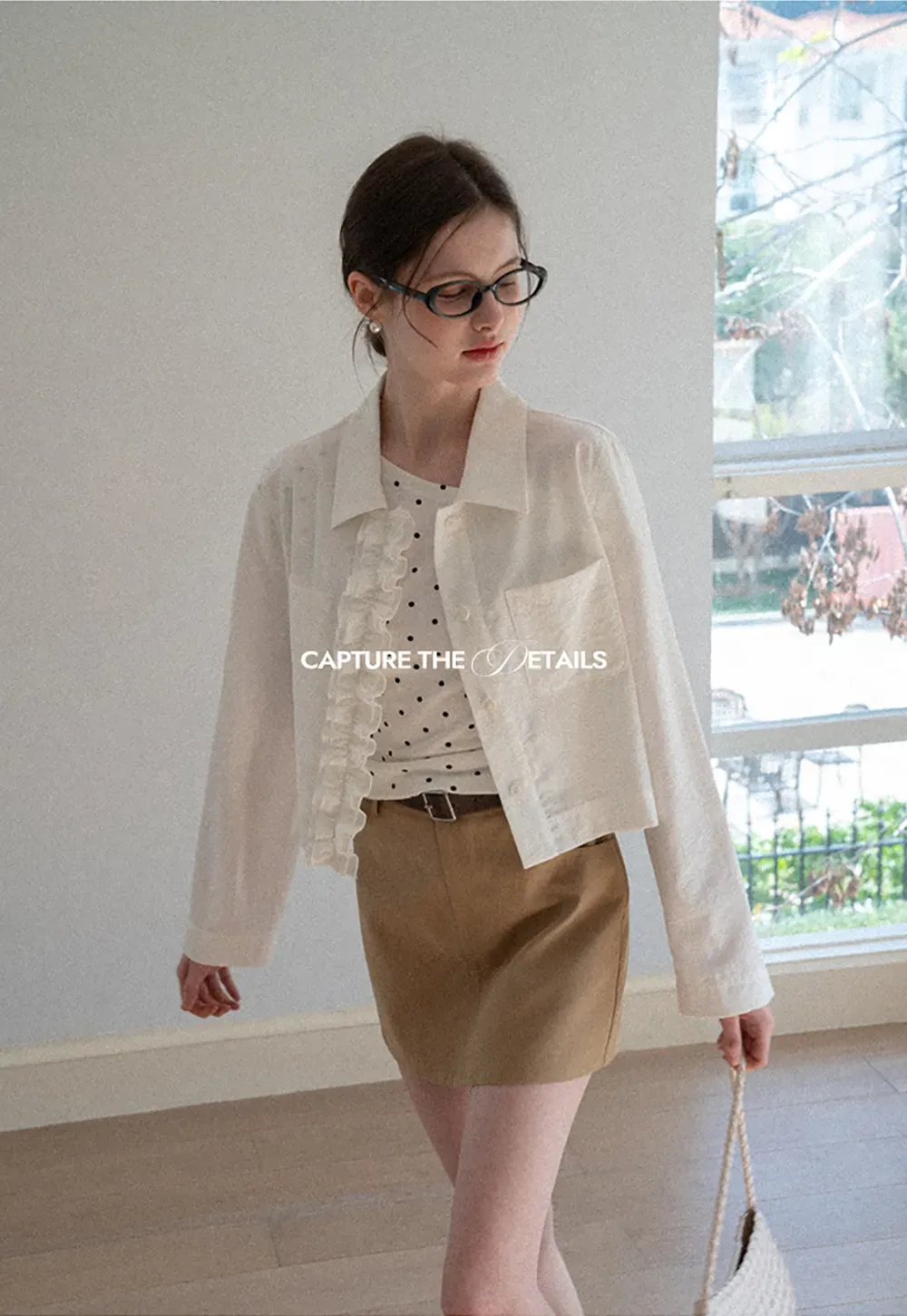 Short jacket with ruffled front placket and collar