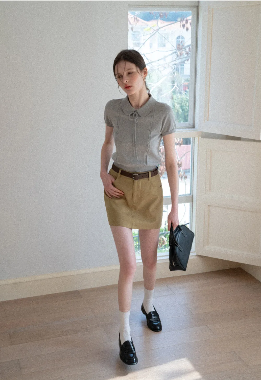 A-line mini skirt with front pockets and belt loops