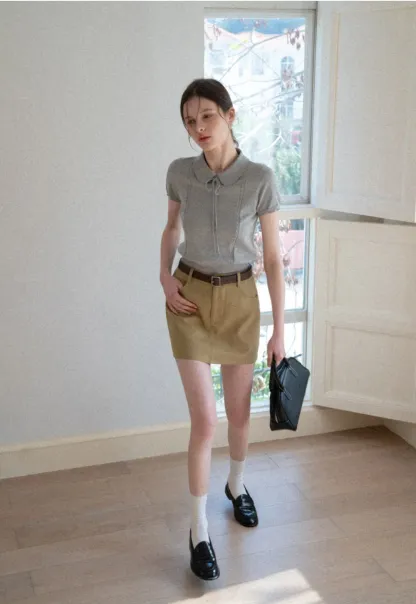 A-line mini skirt with front pockets and belt loops