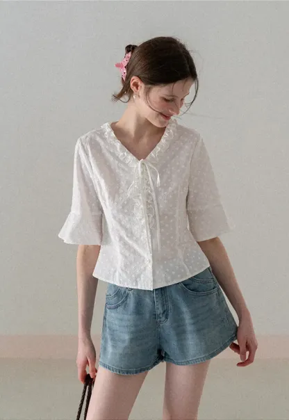 V neck blouse with lace trim and tie front