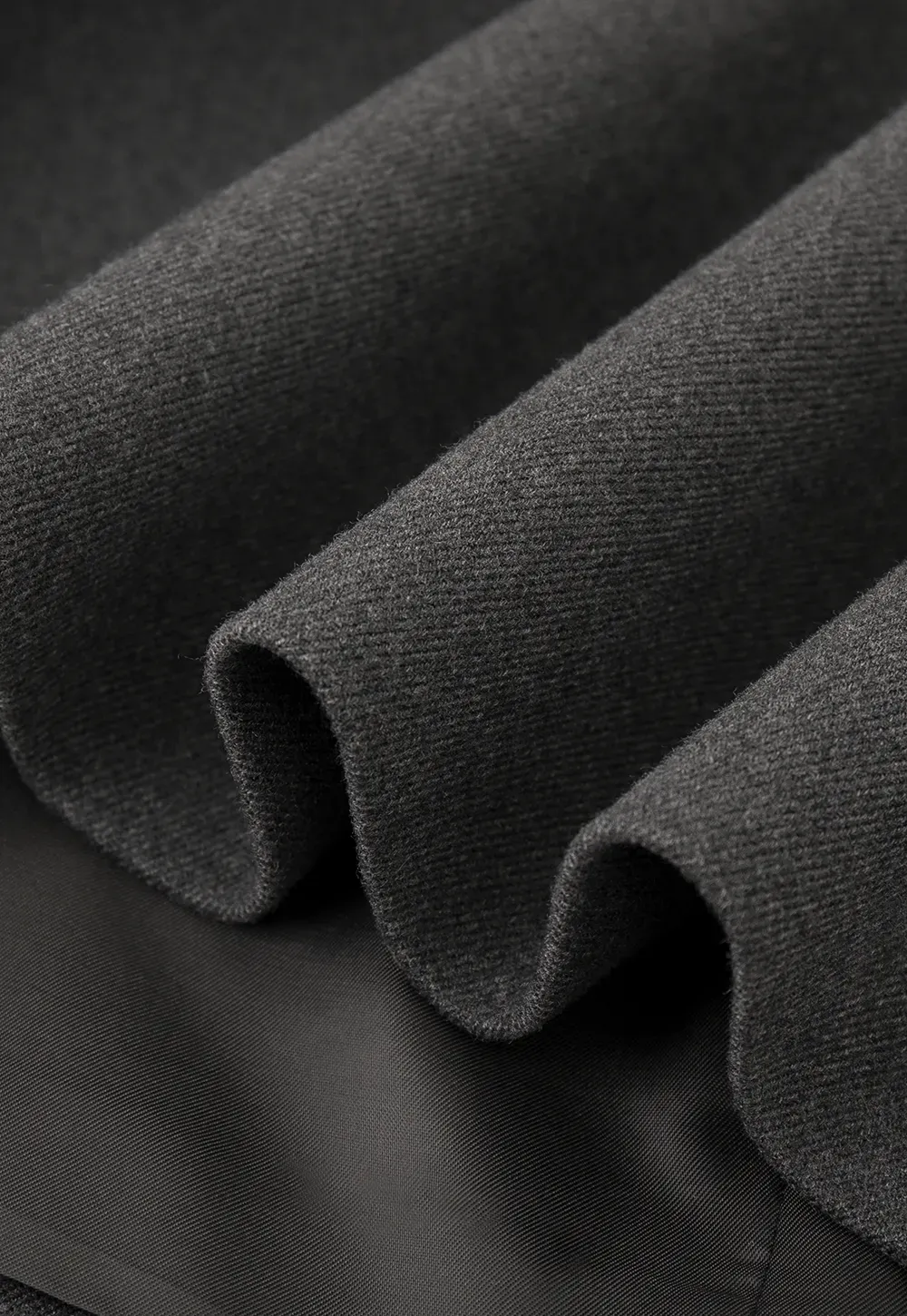 Elegant sleeveless dress with collar layered over polka dot top