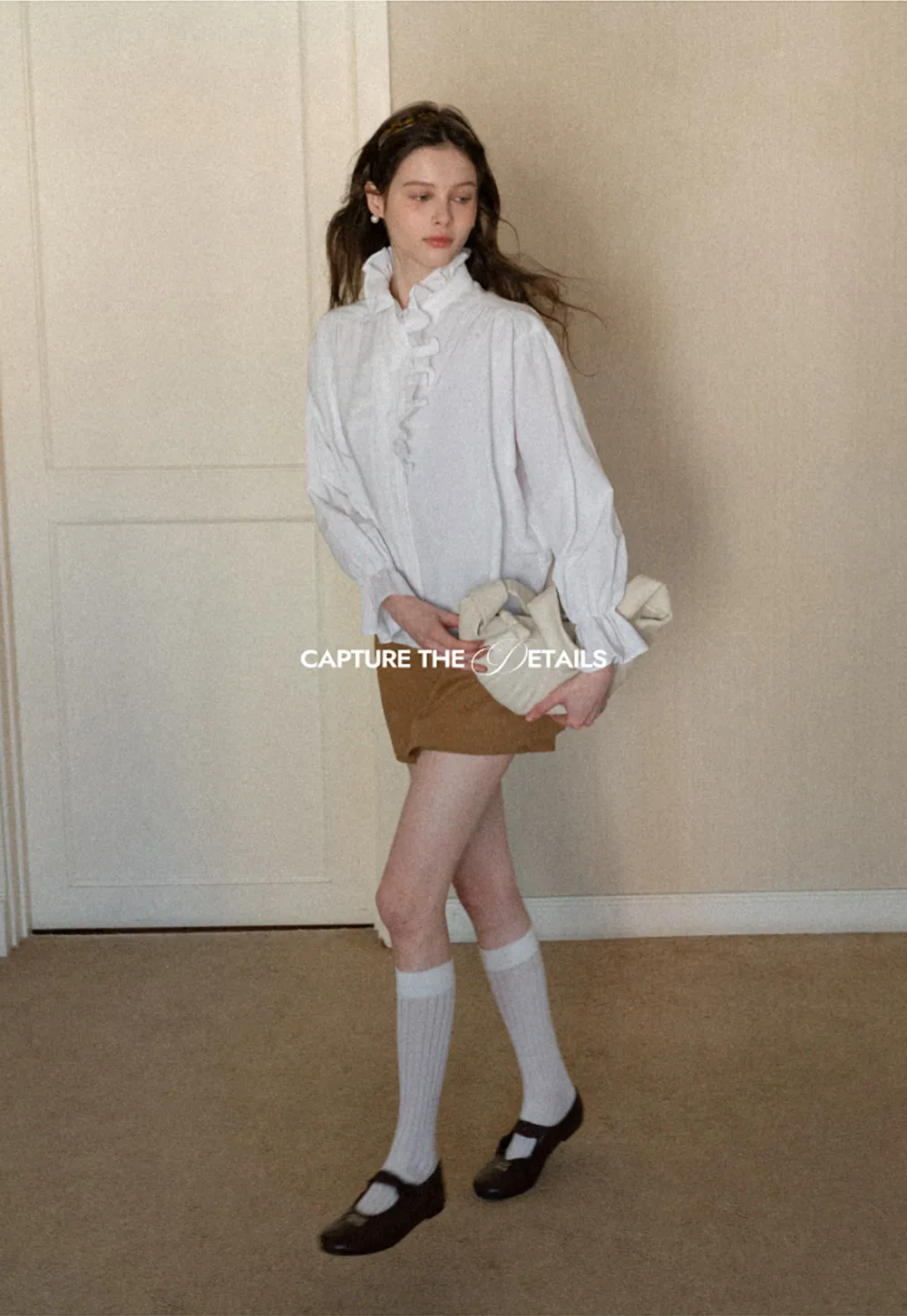 High waist pleated mini skirt with button front design