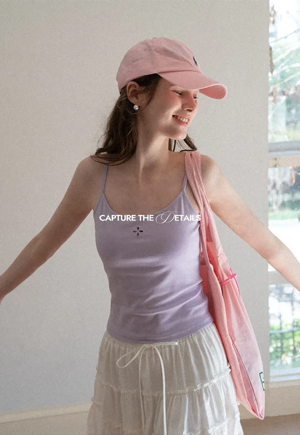 Gray tank top with small embroidered cross detail