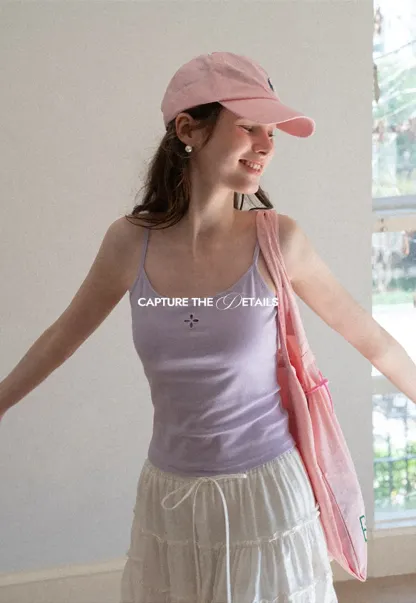 Gray tank top with small embroidered cross detail