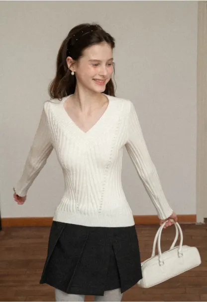 Elegant Ribbed Knit Sweater with V-Neck Design