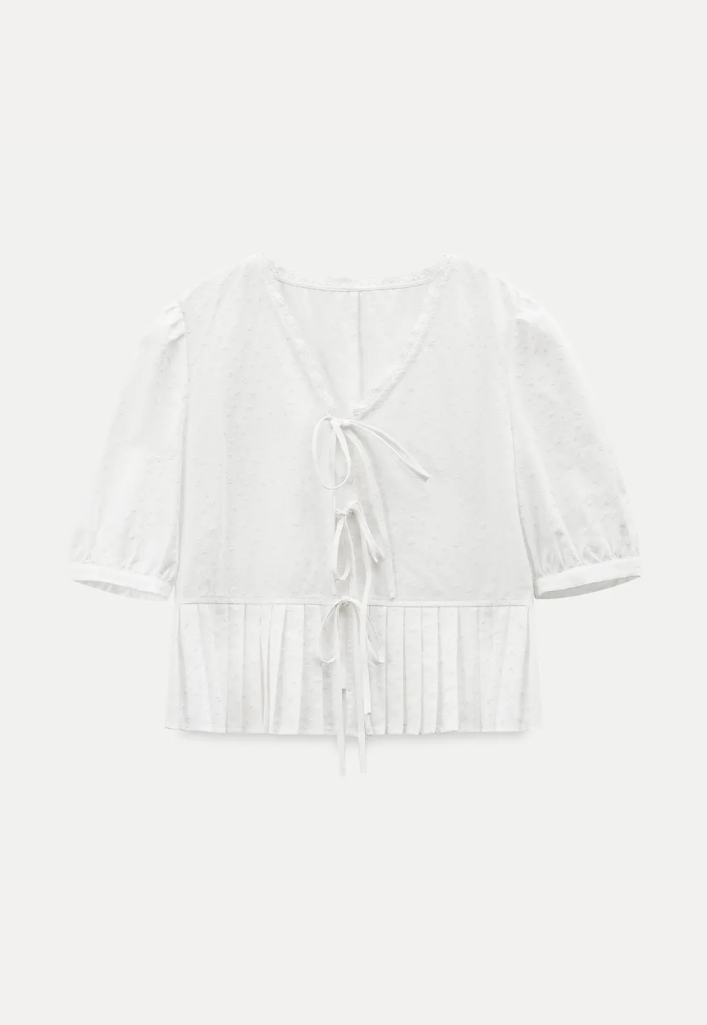 V neck short sleeve blouse with pleated hem and tie front