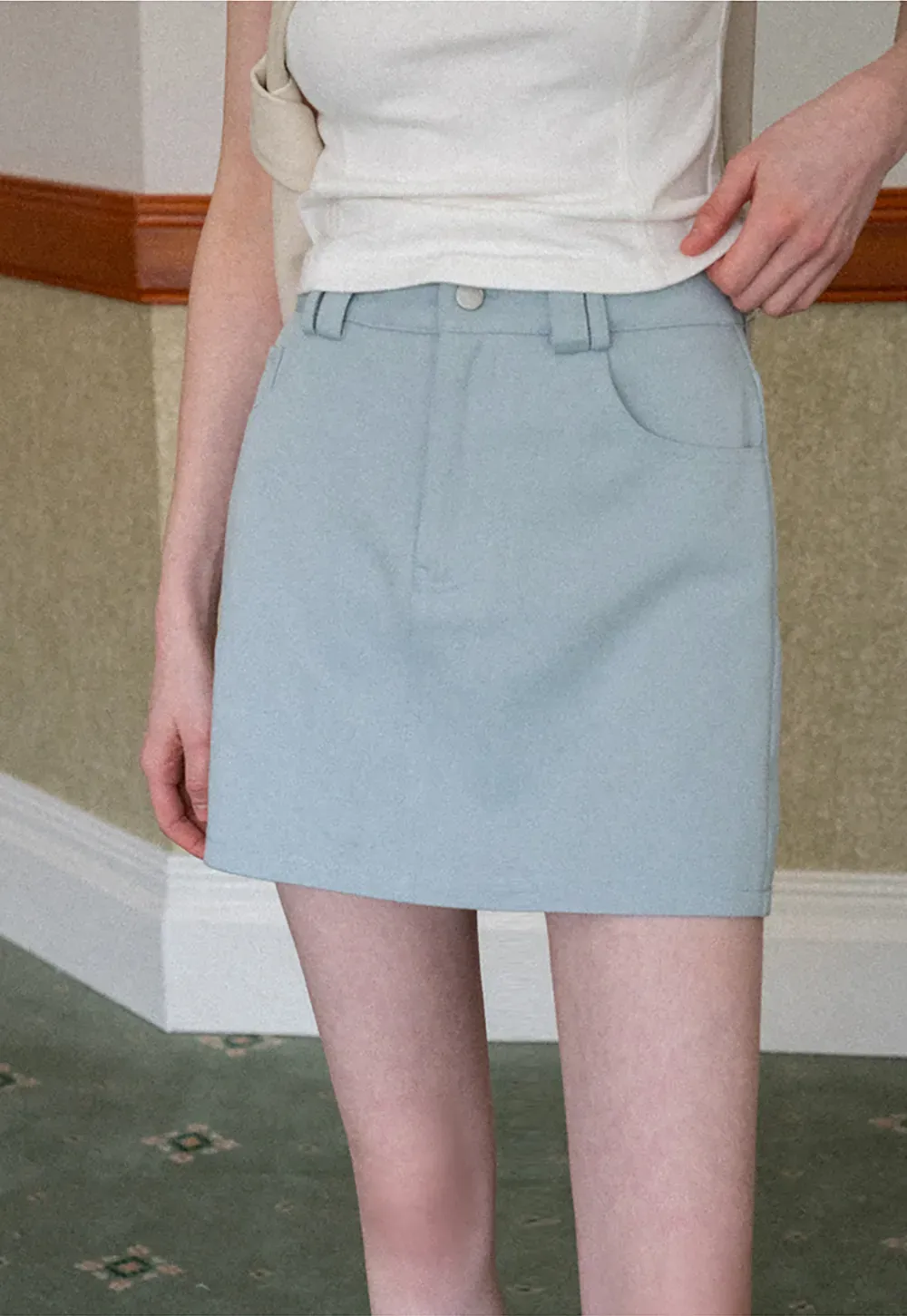 A-line mini skirt with front zipper and belt loops