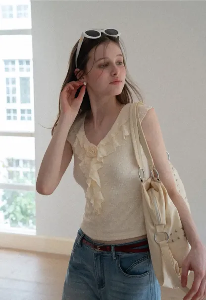 Sleeveless Top with Ruffled V Neck and Floral Detail