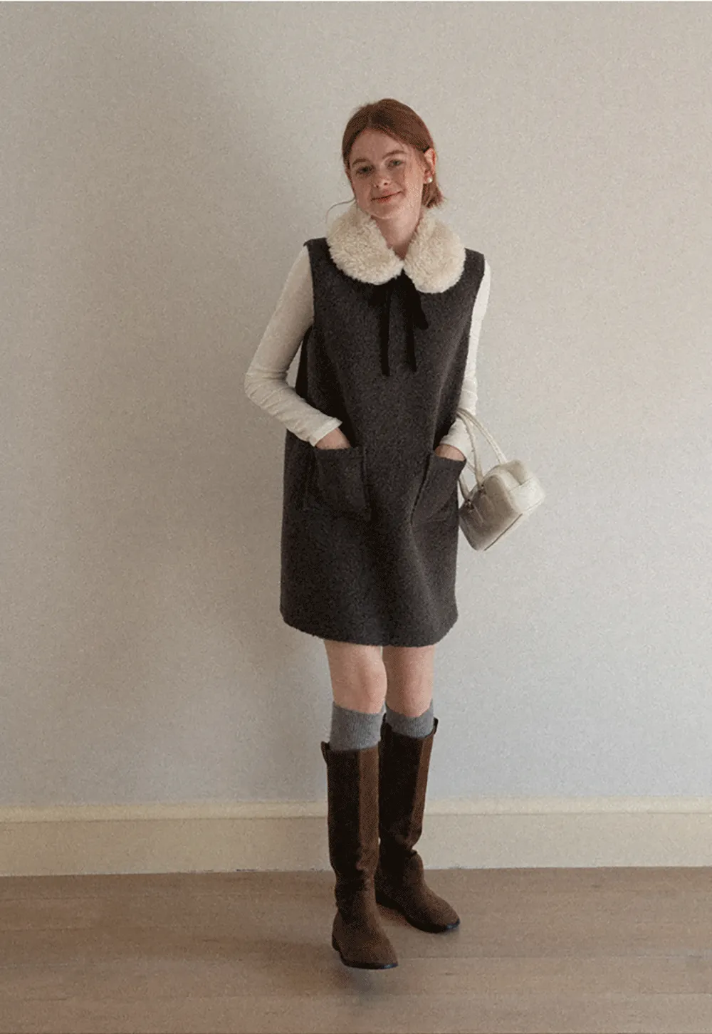 Elegant Long Sleeve Top with Ruffled Hem and Collar Design