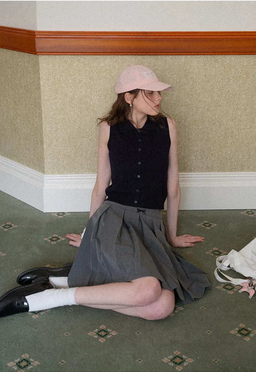 Pleated skirt with front bow detail