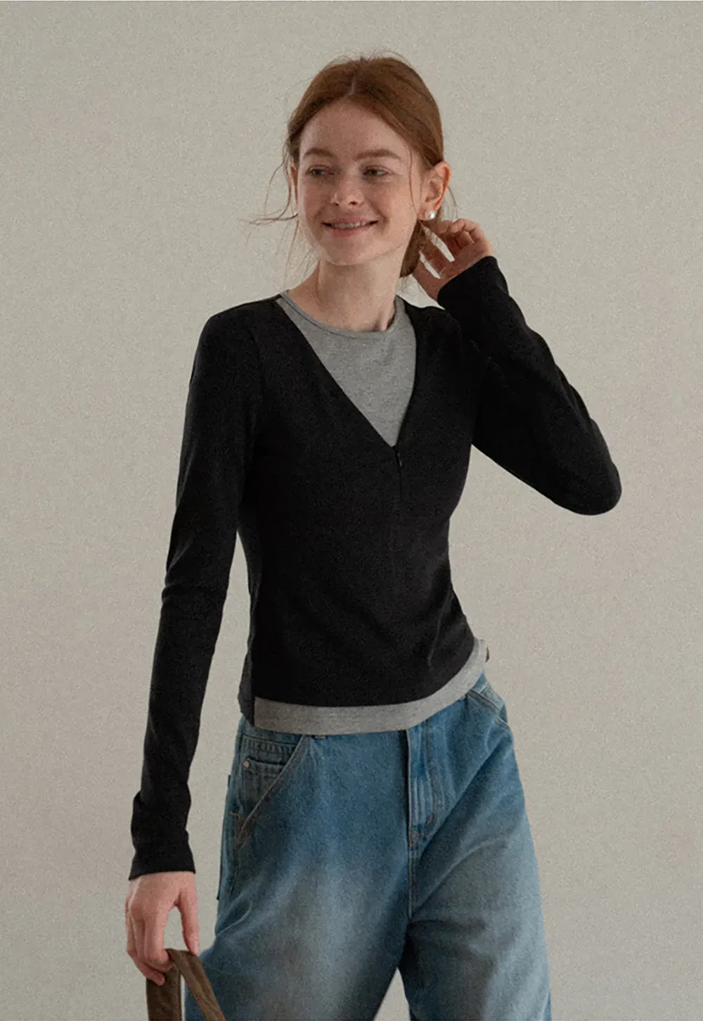 Long sleeve crop top with round neck and hem stitching design