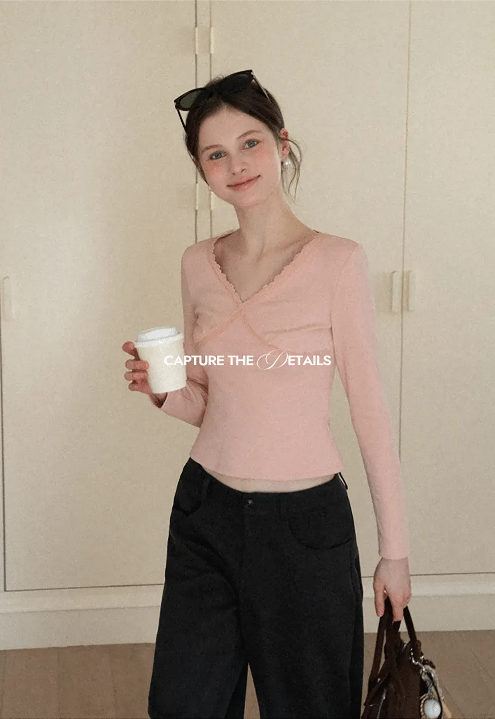 V neck long sleeve top with lace trim and fitted design