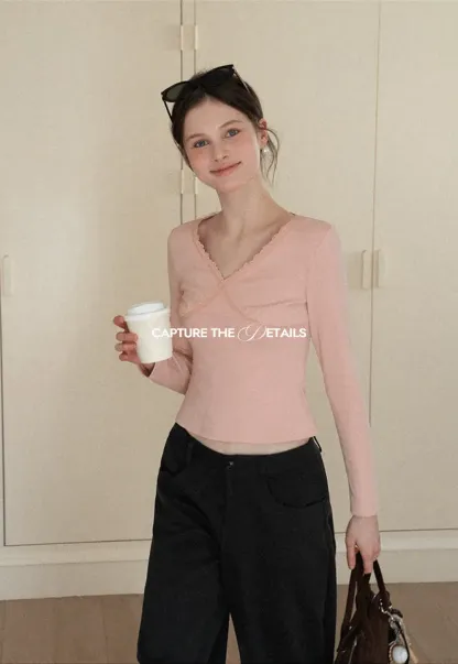 V neck long sleeve top with lace trim and fitted design
