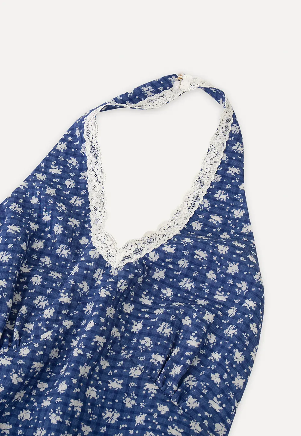 Halter neck dress with floral print and lace trim