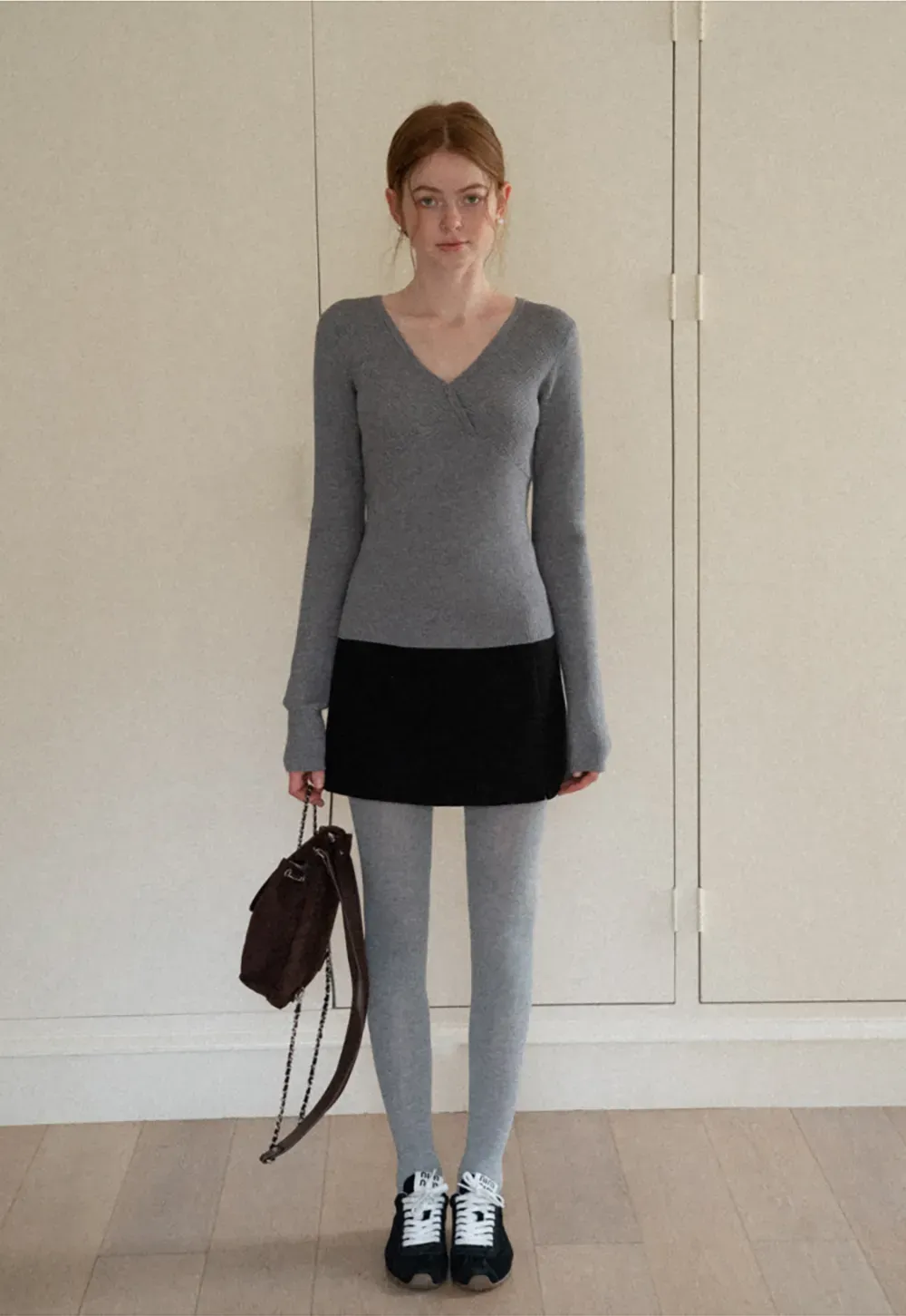 A-line mini skirt with textured fabric and central seam design