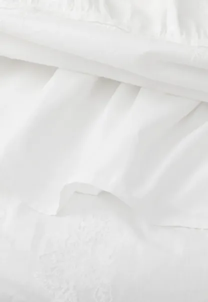 Shirt with ruffled sleeves and layered skirt