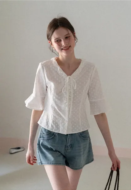 V neck blouse with lace trim and tie front