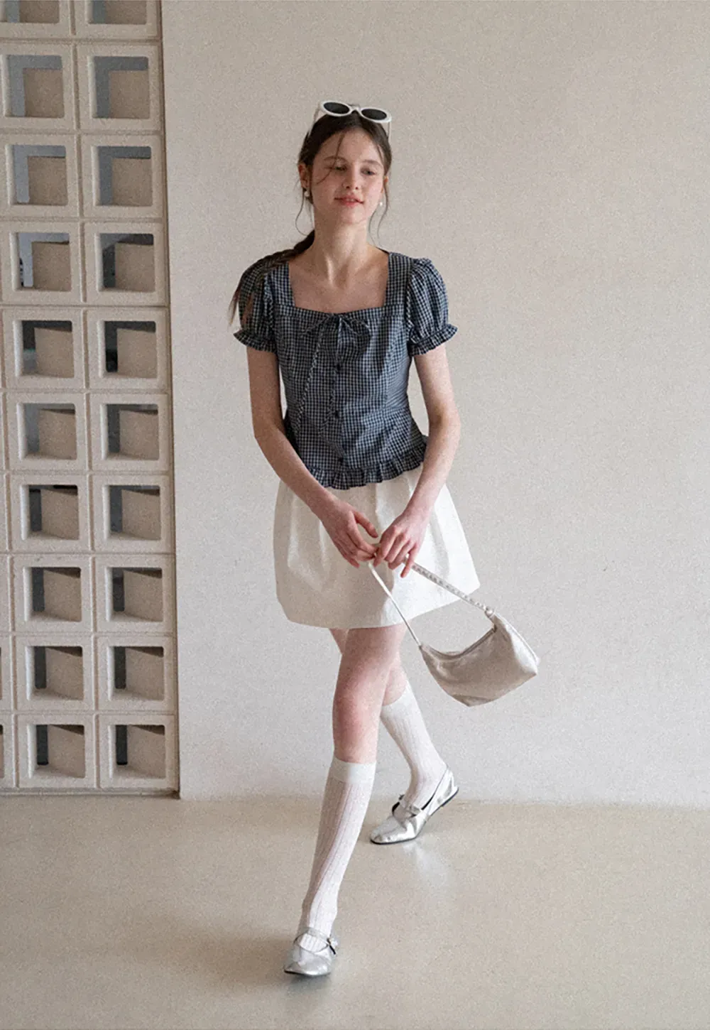 Plaid skirt with pleats and ruffled top