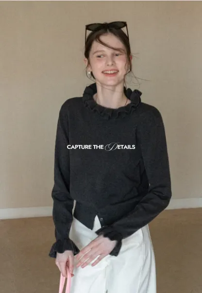 Elegant Ruffle Detail Knit Sweater with Flared Cuffs and Neckline