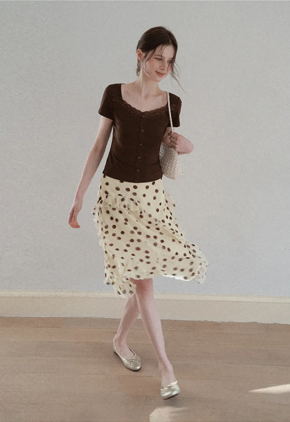 Polka dot ruffled asymmetrical midi skirt