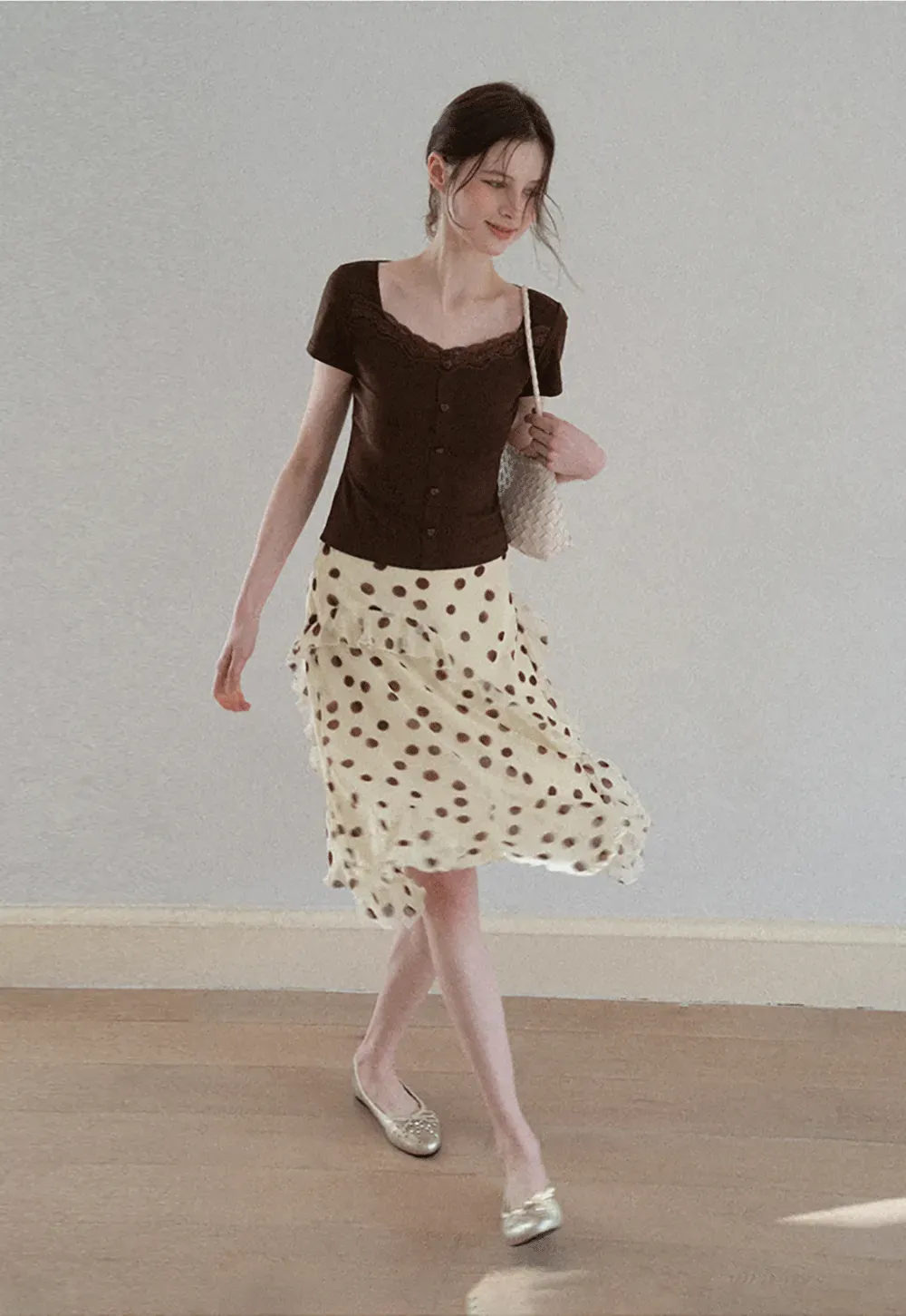 Polka dot ruffled asymmetrical midi skirt