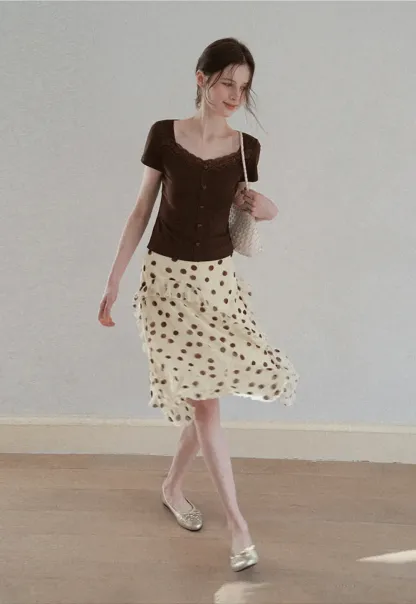 Polka dot ruffled asymmetrical midi skirt