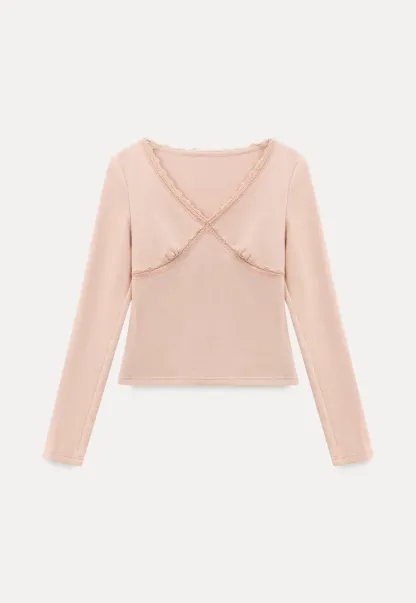 V neck long sleeve top with lace trim and fitted design