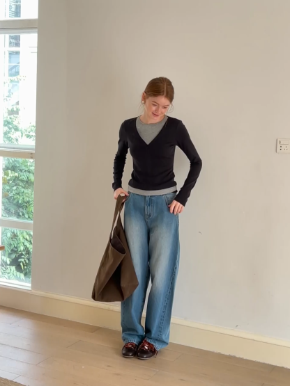 Long sleeve crop top with round neck and hem stitching design