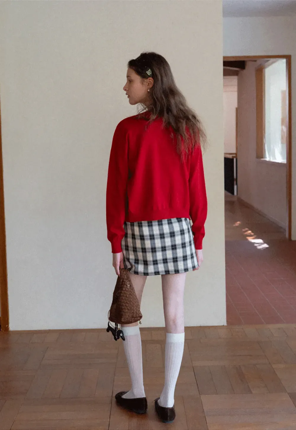 Woolen knit sweater with horse and bow motifs