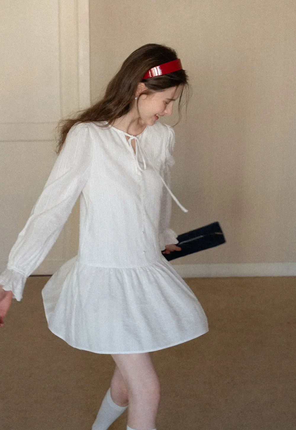 Elegant Long Sleeve Mini Dress with Flared Hem and Neck Tie