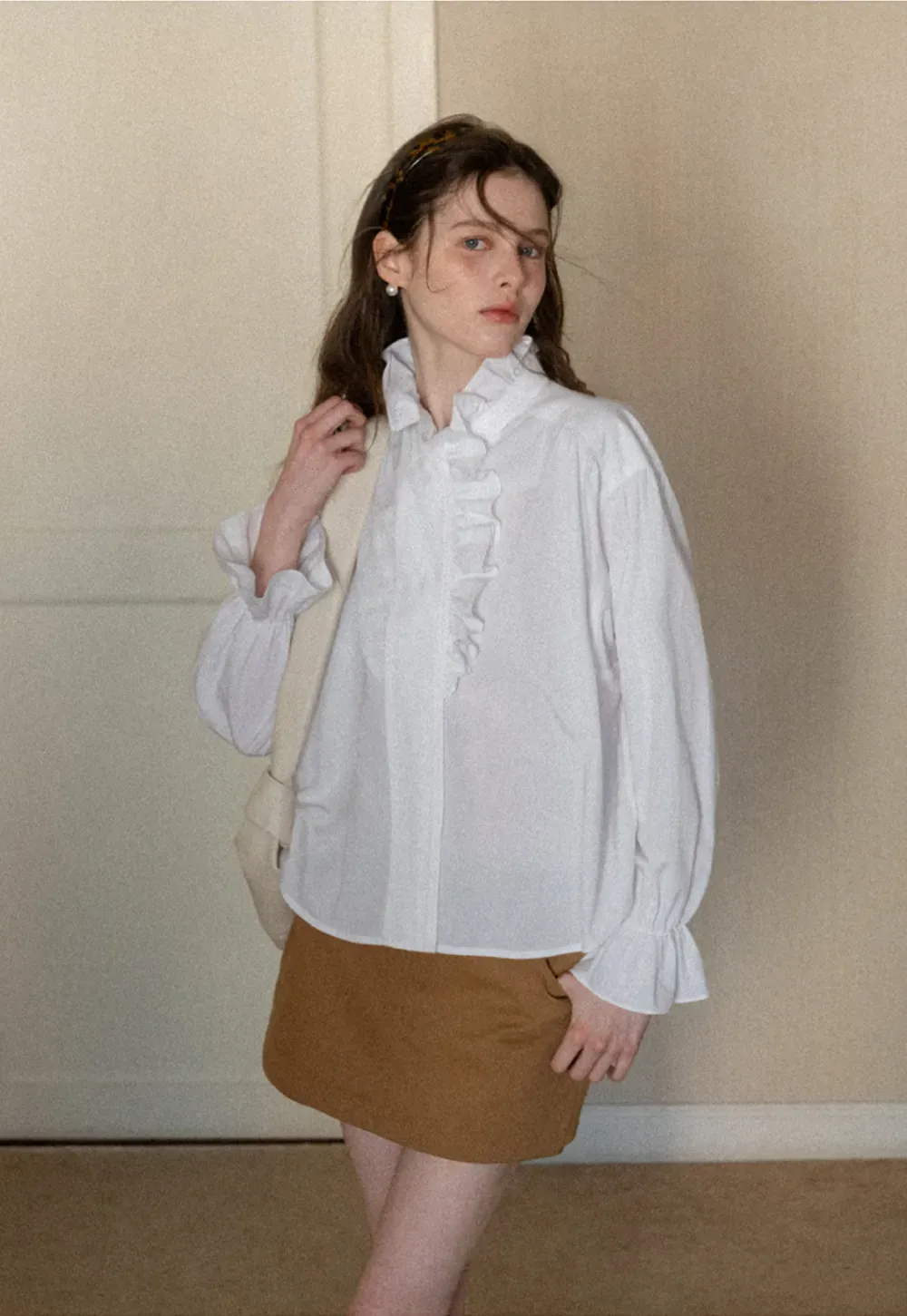 High waist pleated mini skirt with button front design