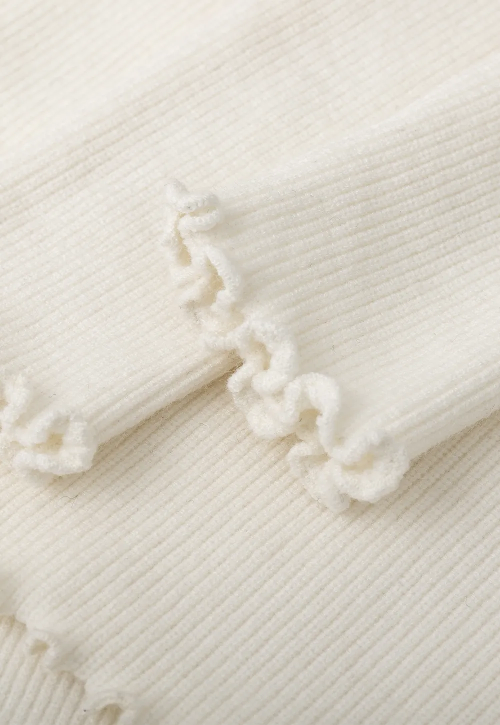 Elegant V Neck Lace Trim Knit Top with Asymmetrical Hem