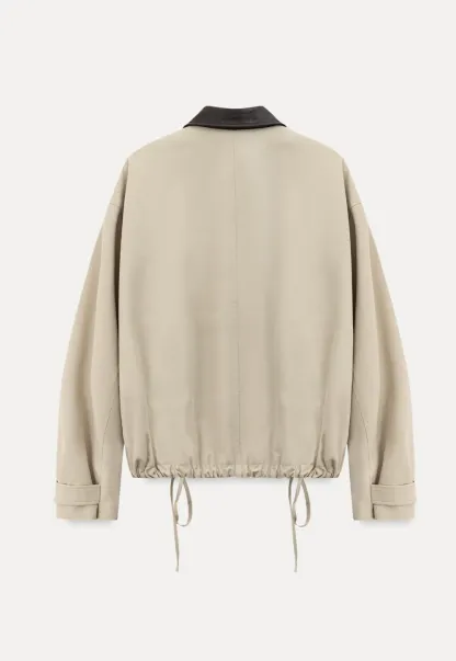 Short jacket with contrast collar and front buttons