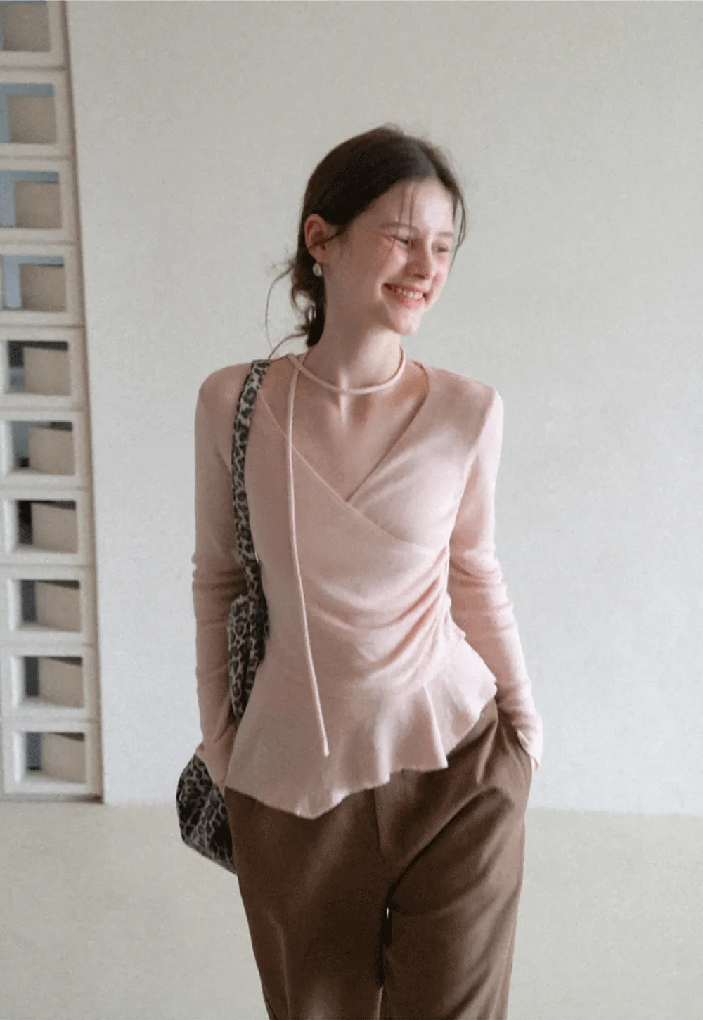 Long sleeve wrap knit sweater with ruched detail