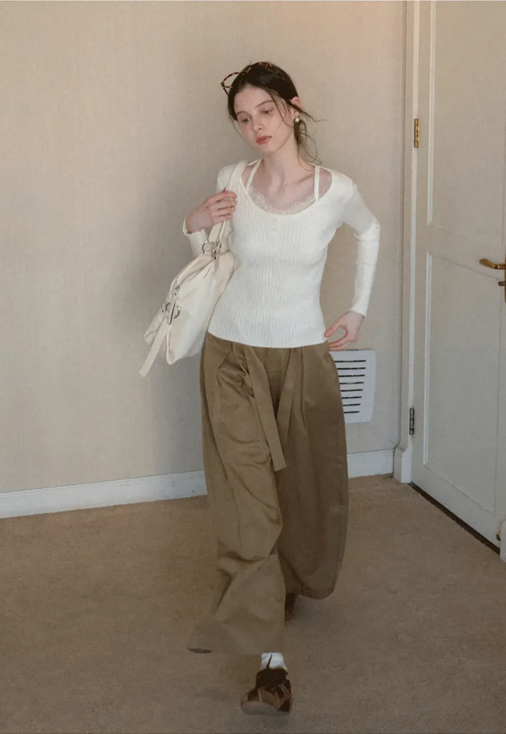 Ribbed knit sweater with boat neck and long sleeves