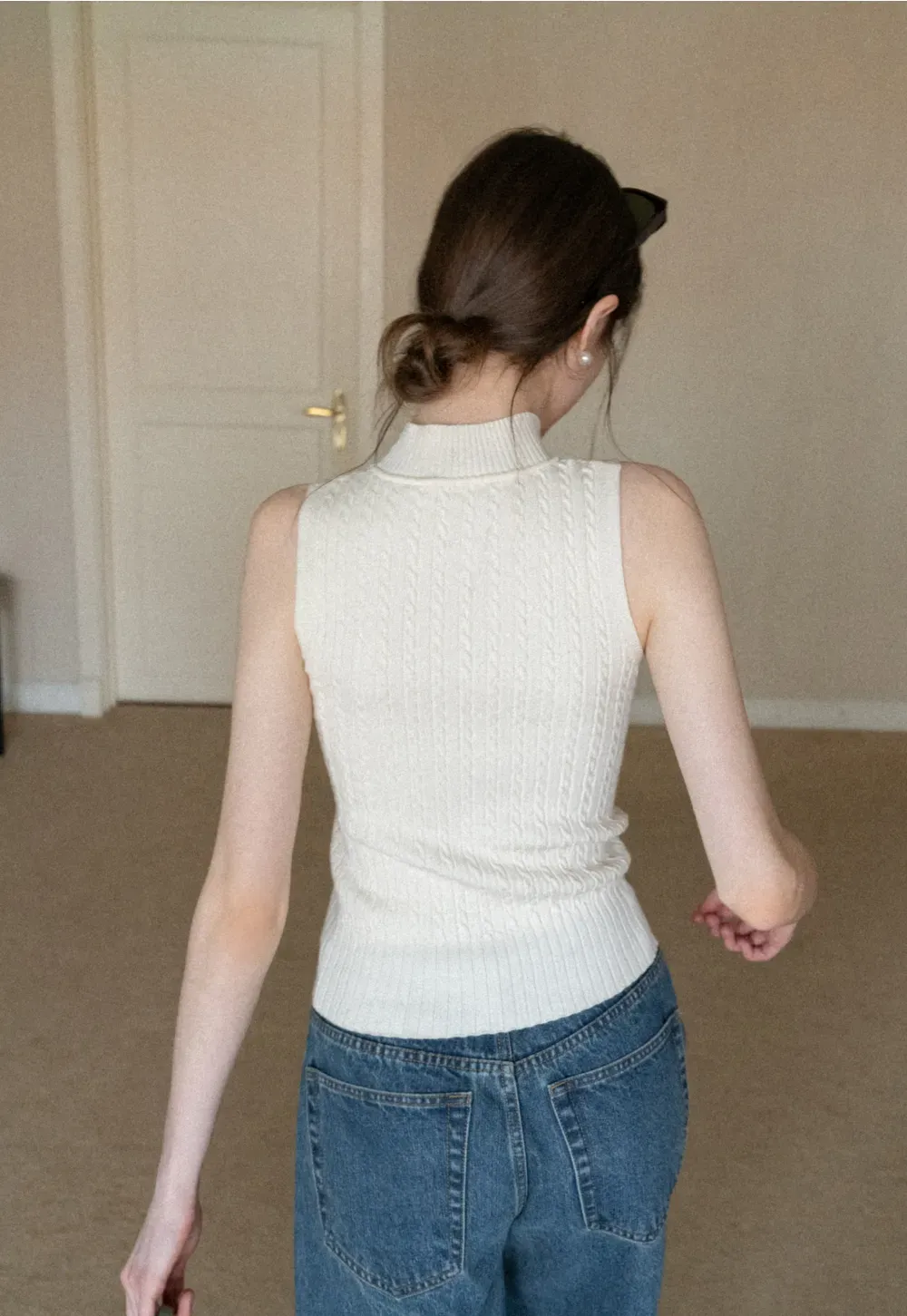 Cable Knit Sleeveless Top with High Neck Design