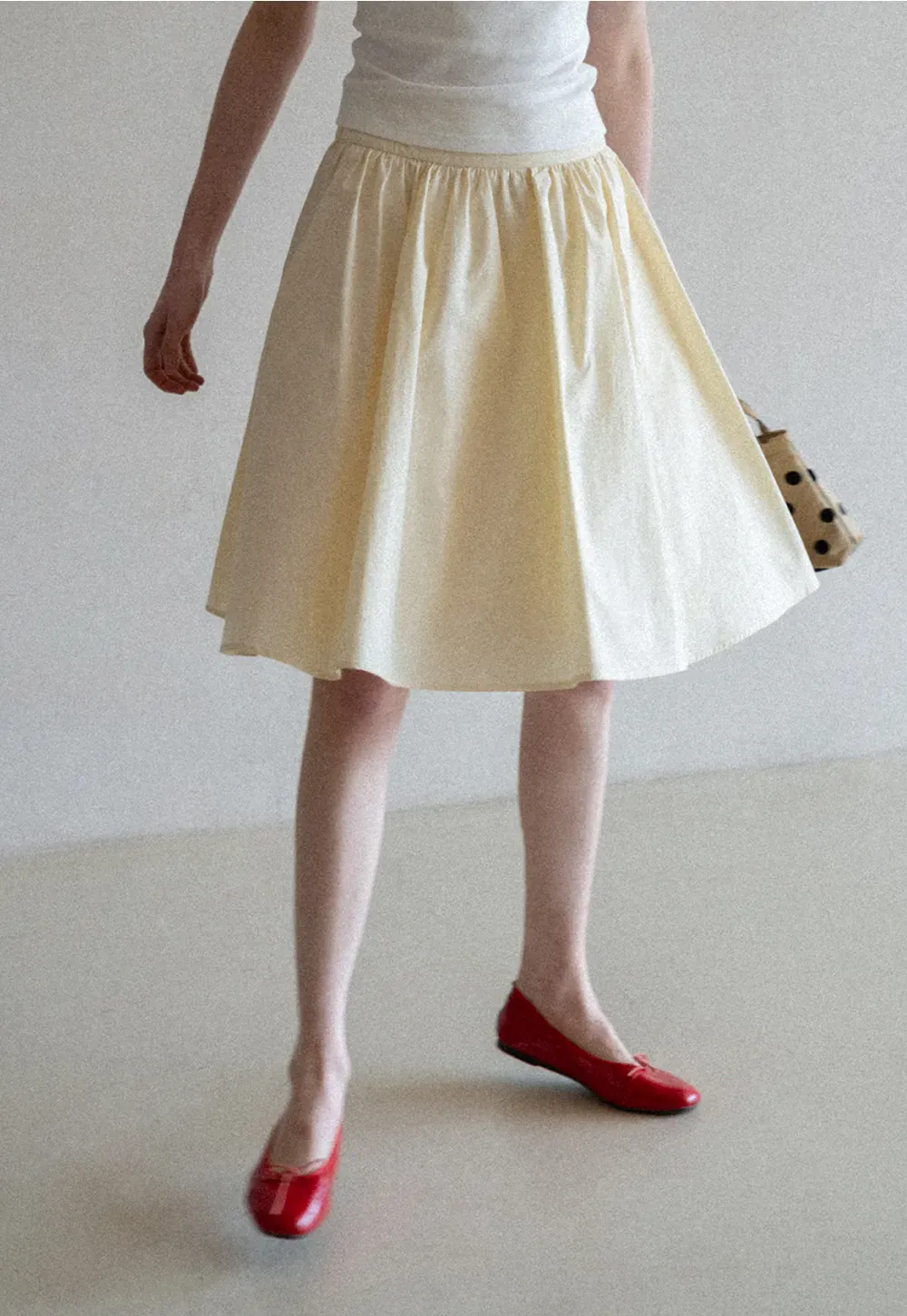 A-line pleated midi skirt with waistband