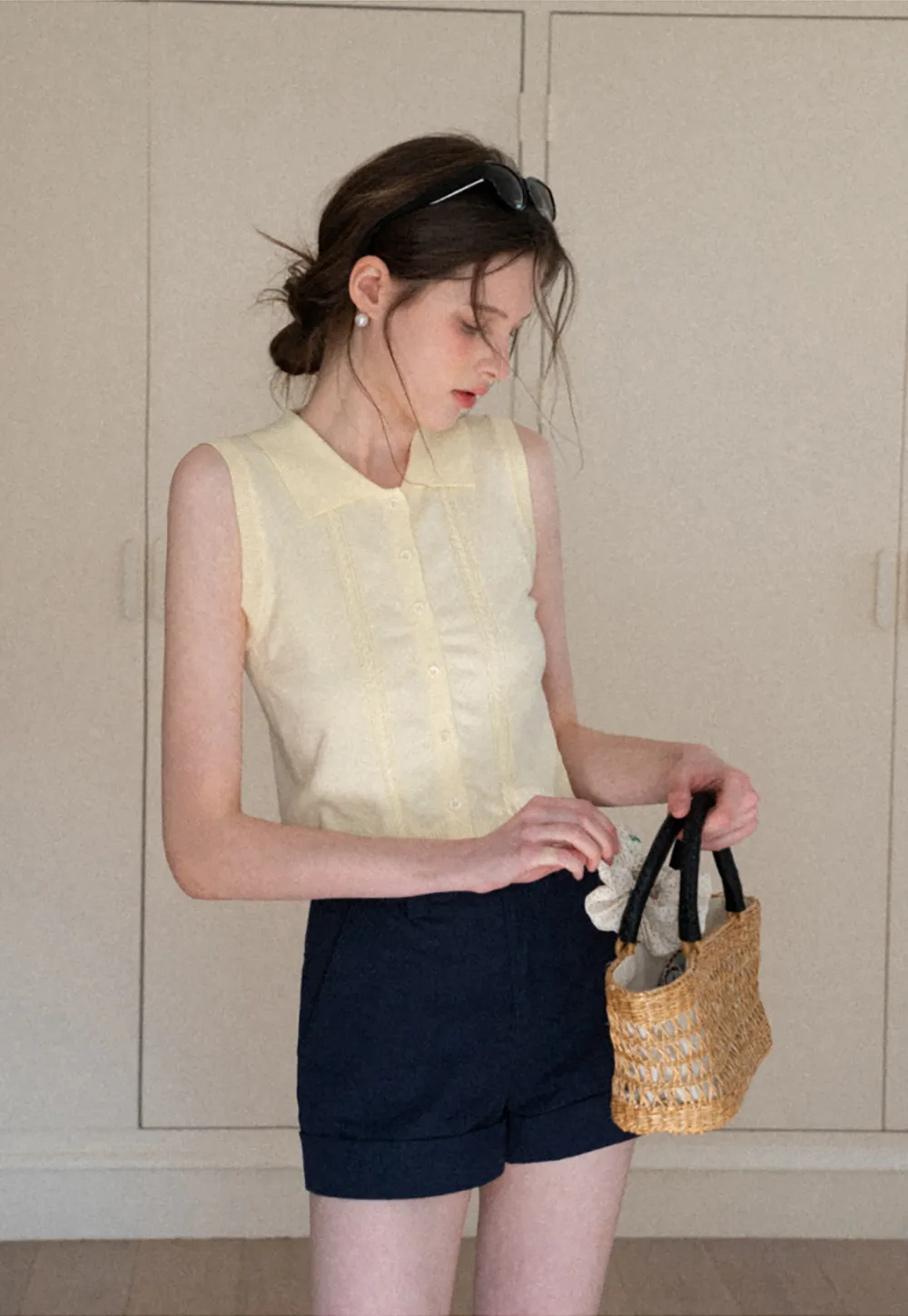 Sleeveless Knit Top with Collar and Buttons