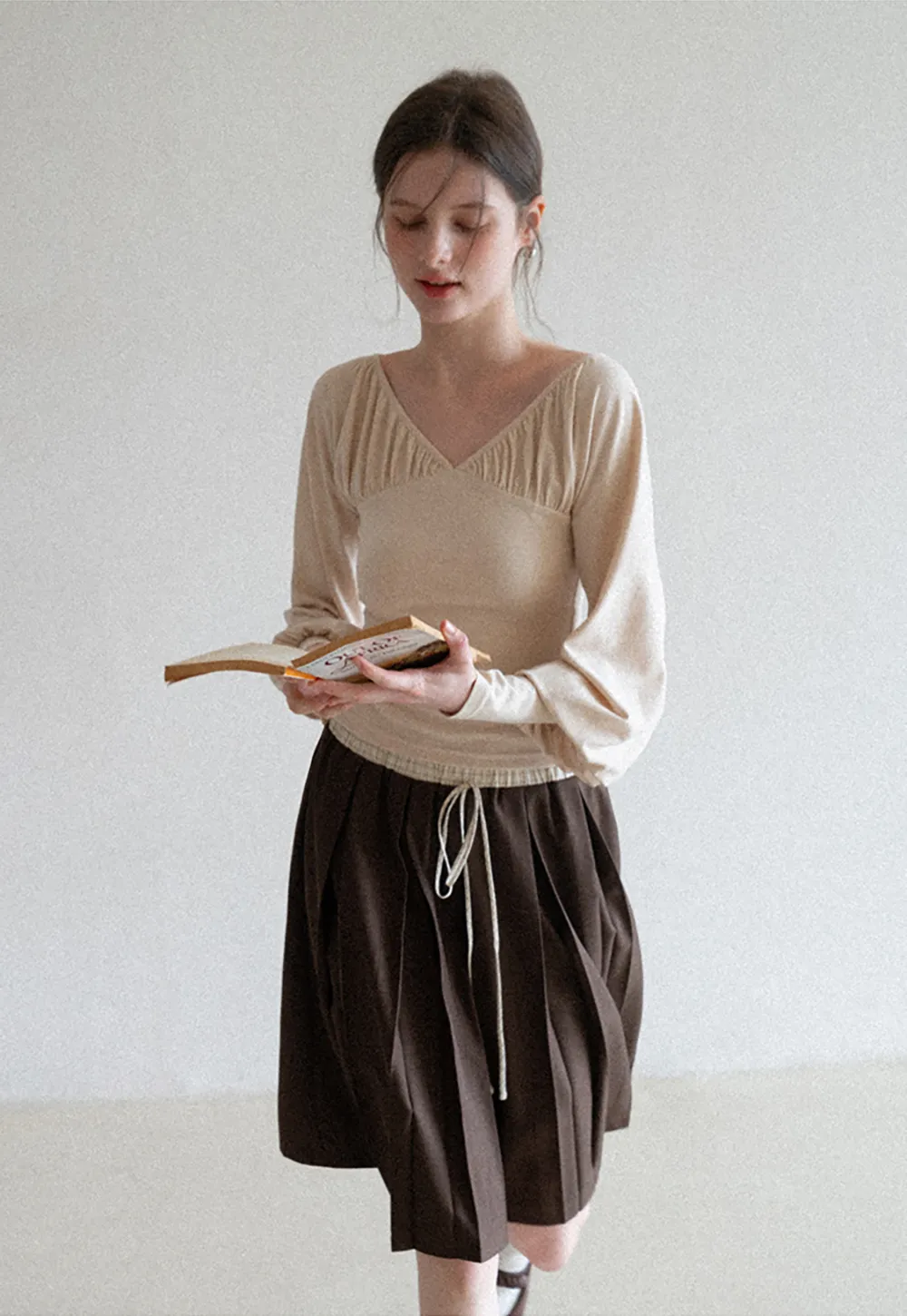 V neck long sleeve top with ruched detail