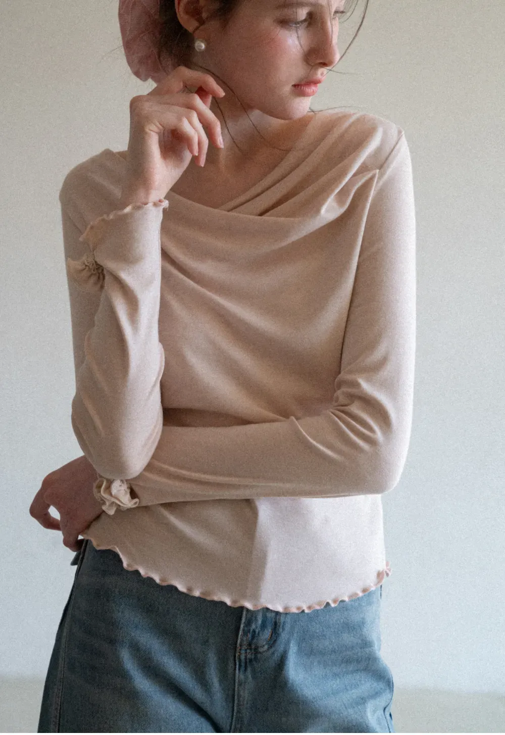 Long sleeve top with ruffled hem and cuffs